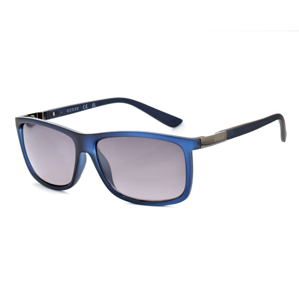 Lunettes de soleil Guess bleu en résine, verres gris, mesures 59/13/140 mm, monture rectangulaire.