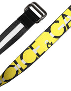 Ceinture Dolce & Gabbana noir et jaune à rayures, logo en lettres sur nylon, boucle métallique, largeur 3,5 cm.