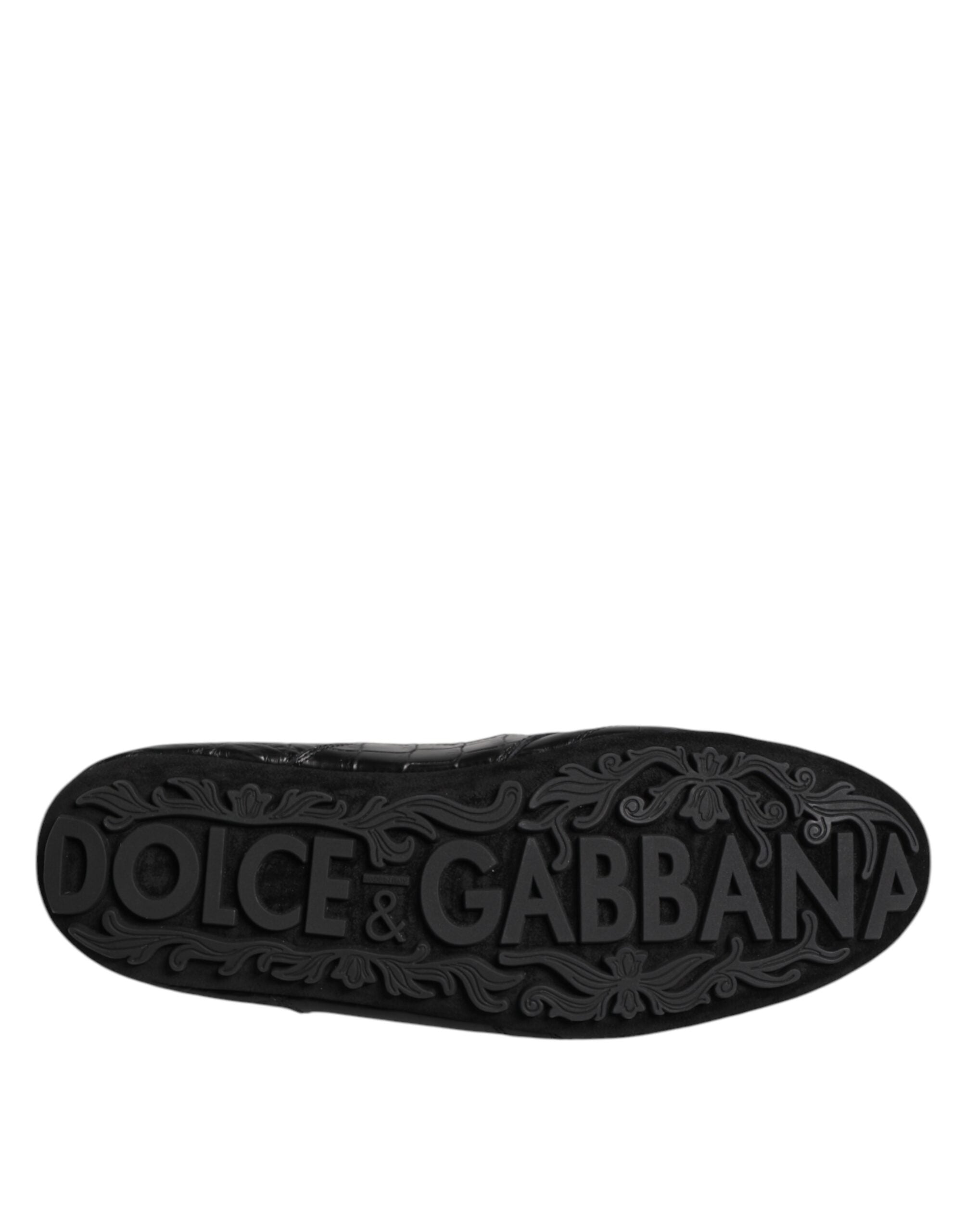 Semelle extérieure noire de sneakers Dolce & Gabbana, logo gravé DOLCE & GABBANA et motifs décoratifs.