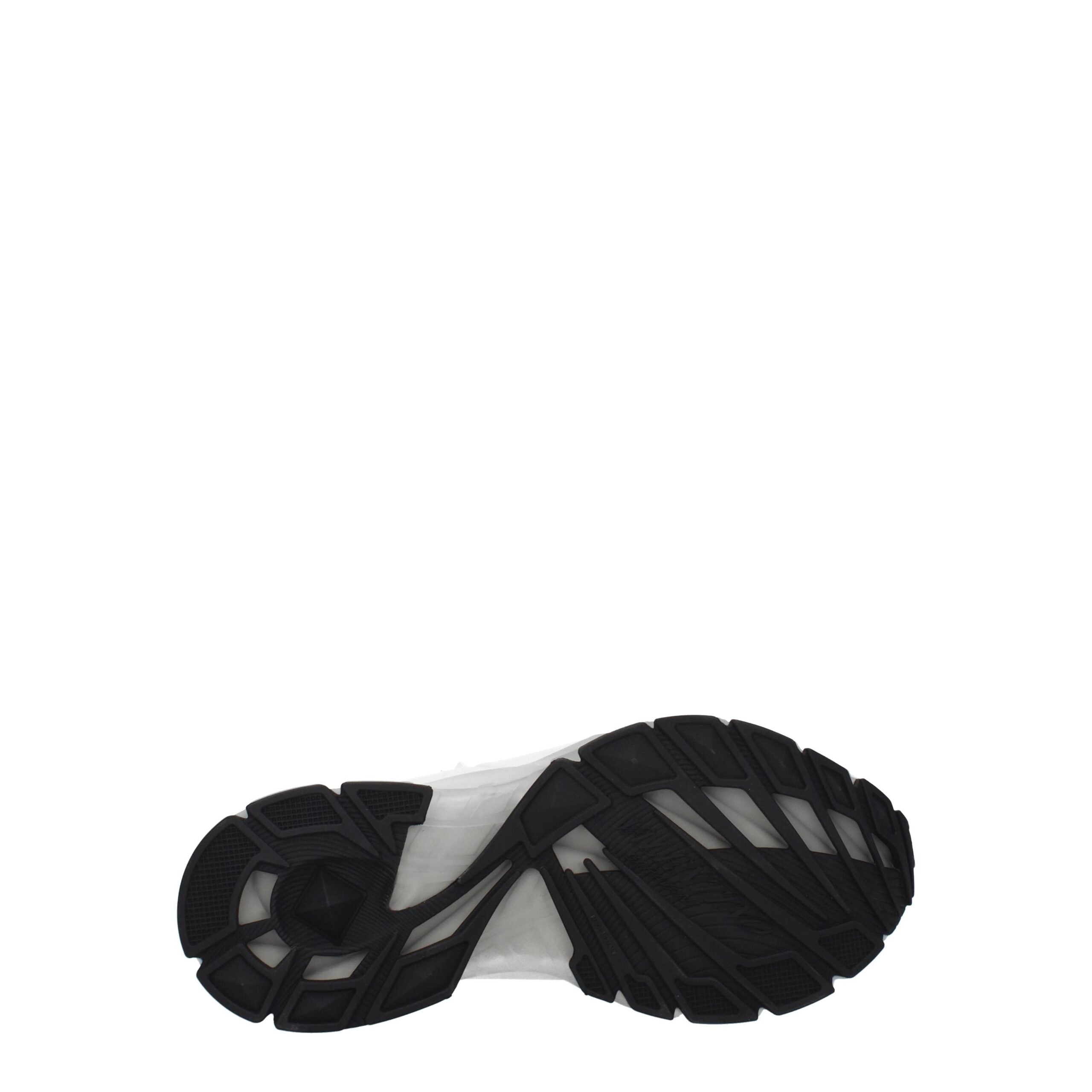 Semelle extérieure noire d’une sneaker en tissu blanc, style casual à lacets.